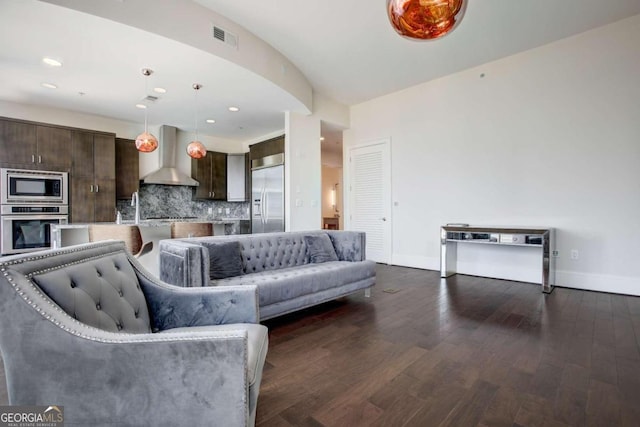 living room featuring dark hardwood / wood-style floors