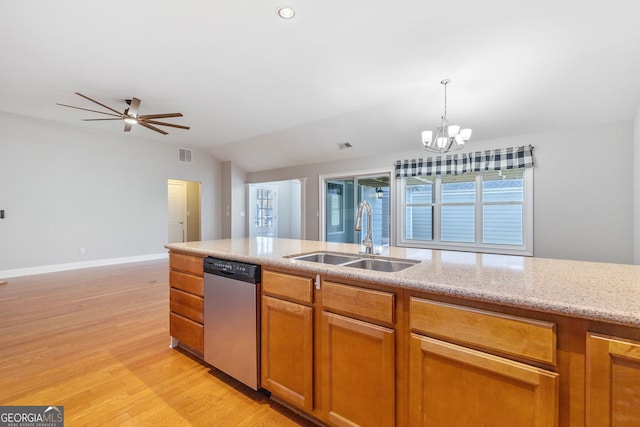 kitchen with light hardwood / wood-style floors, sink, hanging light fixtures, lofted ceiling, and dishwasher