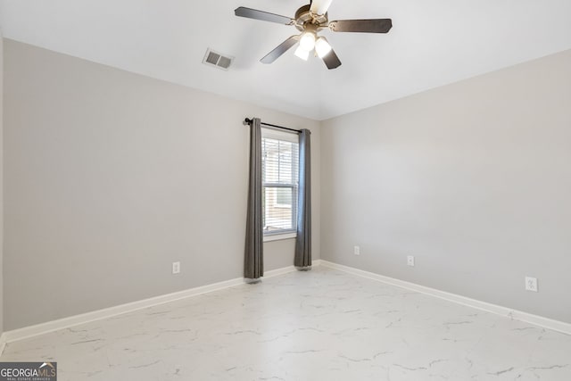 spare room with ceiling fan