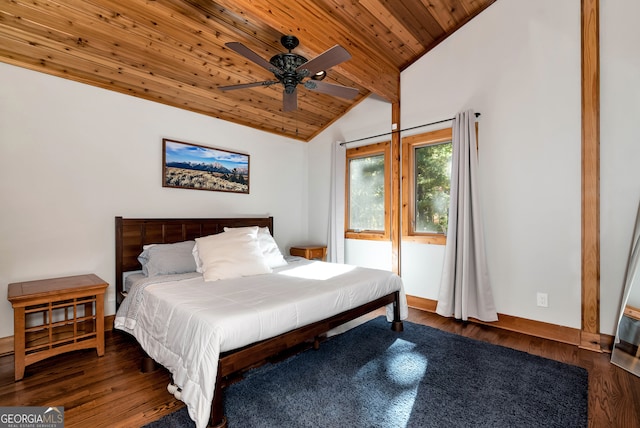 bedroom with ceiling fan, dark hardwood / wood-style floors, vaulted ceiling with beams, and wood ceiling