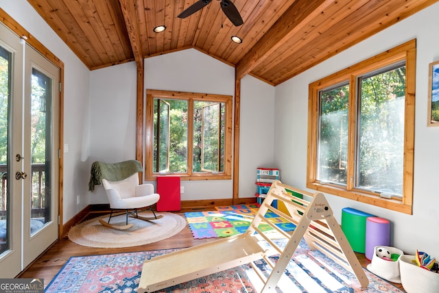 game room featuring plenty of natural light, lofted ceiling, wooden ceiling, and wood-type flooring