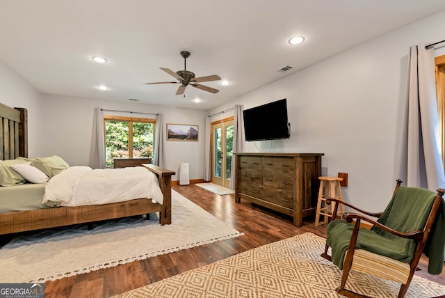 bedroom featuring ceiling fan and dark hardwood / wood-style flooring