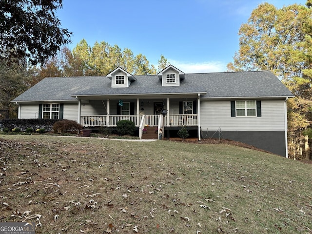 view of front of property with a front yard and a porch