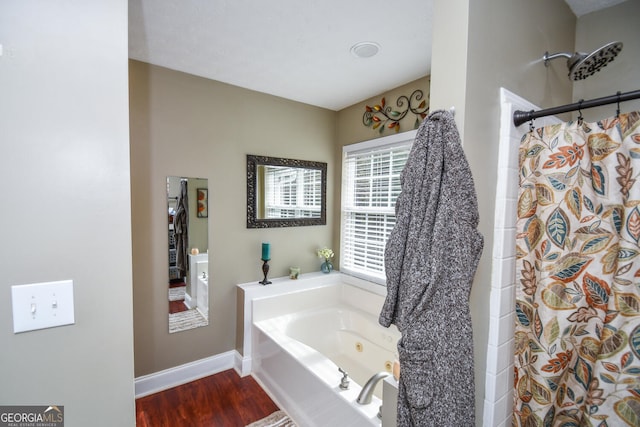 bathroom with shower with separate bathtub and hardwood / wood-style floors