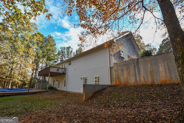 view of home's exterior with a deck