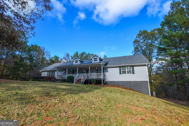 view of front of house featuring a porch and a front lawn