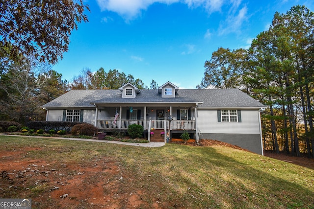 view of front of house featuring a porch and a front lawn