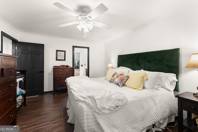 bedroom with dark hardwood / wood-style flooring, ceiling fan, and crown molding