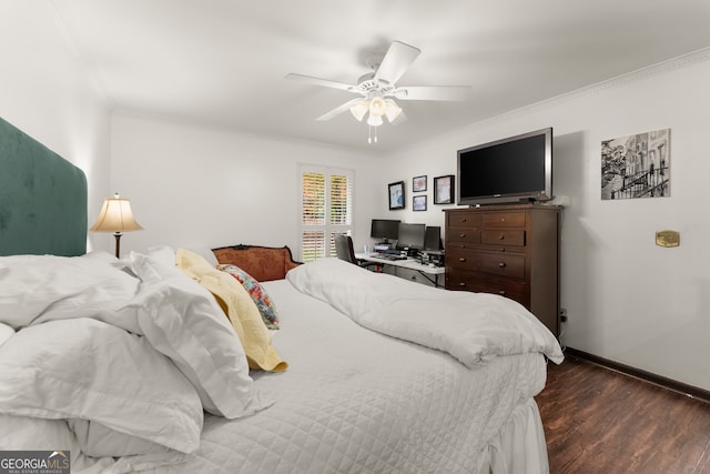 bedroom featuring dark wood-type flooring, ornamental molding, and ceiling fan