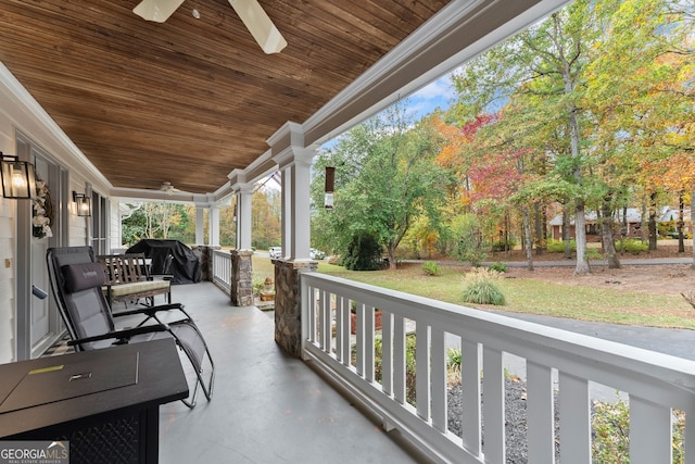 view of patio featuring ceiling fan, covered porch, and grilling area