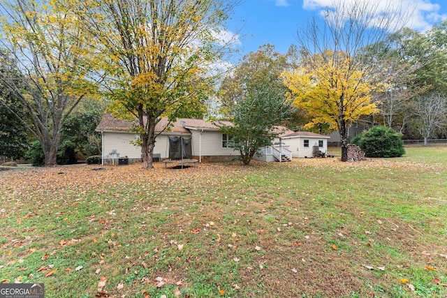 exterior space with a front yard