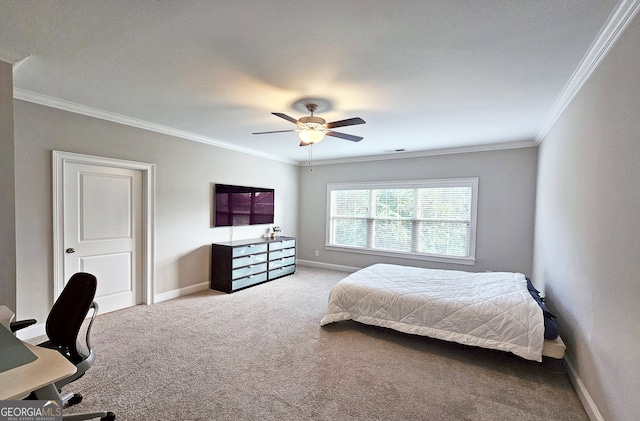 bedroom featuring ceiling fan, carpet flooring, and crown molding