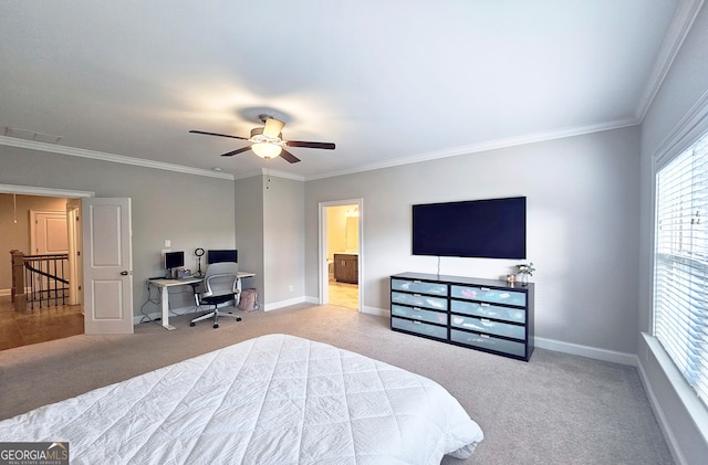 carpeted bedroom with ceiling fan and crown molding