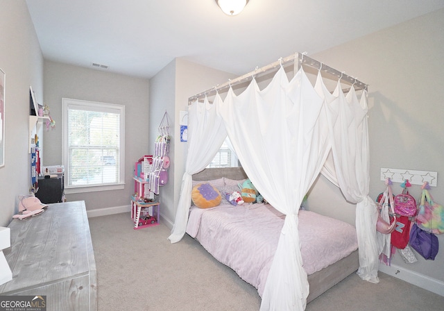 bedroom featuring carpet