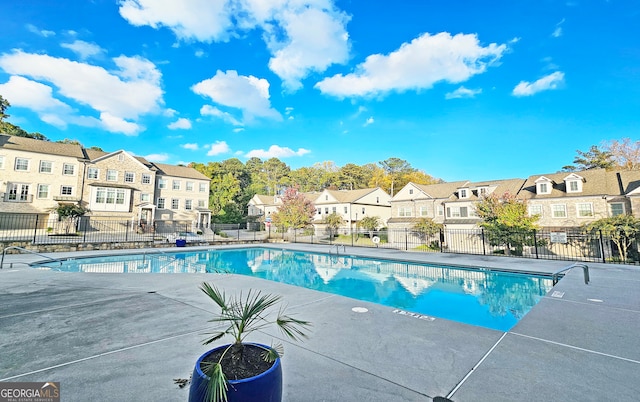 view of pool featuring a patio area