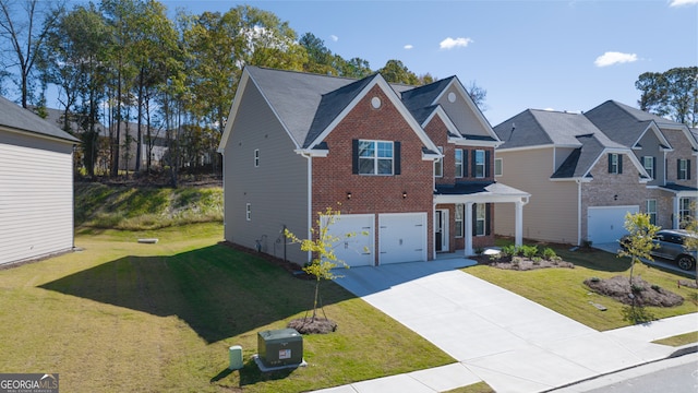 view of front facade featuring a front lawn and a garage