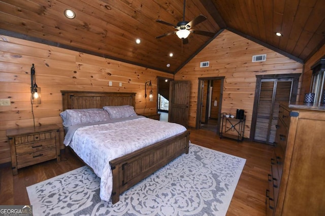 bedroom featuring wood walls, wooden ceiling, vaulted ceiling with beams, ceiling fan, and dark hardwood / wood-style flooring