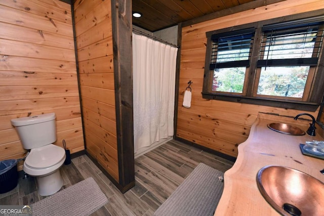 bathroom featuring walk in shower, wood walls, wood-type flooring, toilet, and wood ceiling