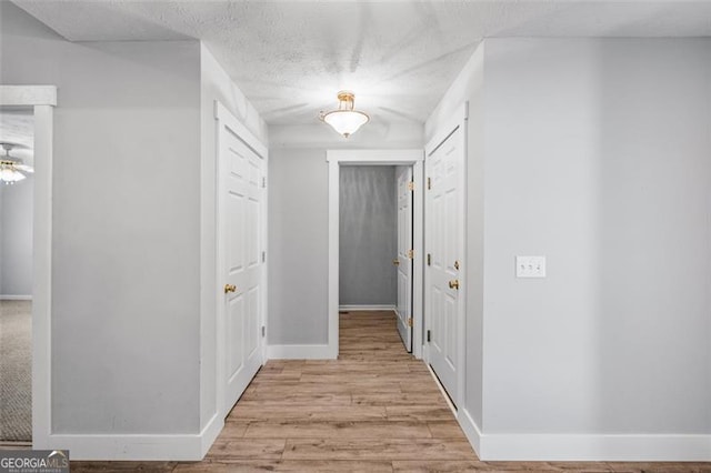 hall featuring light hardwood / wood-style flooring