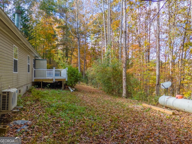 view of yard with a deck