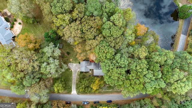 birds eye view of property featuring a water view