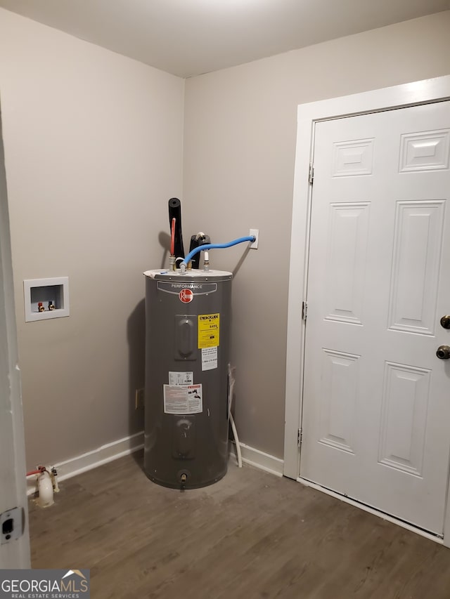 utility room featuring electric water heater