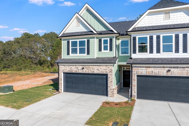 craftsman inspired home with a garage