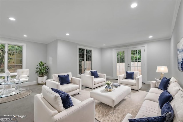 living room featuring ornamental molding and french doors