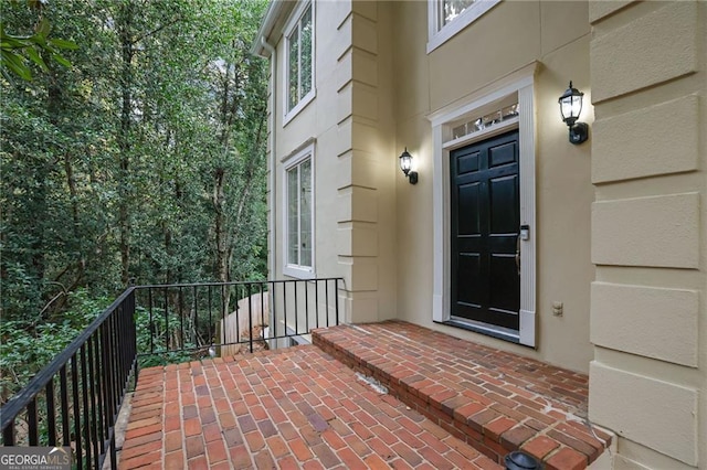 doorway to property with a balcony