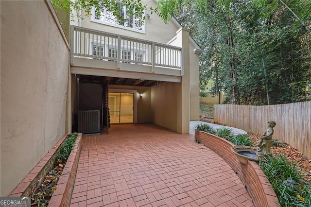 view of patio / terrace with a balcony