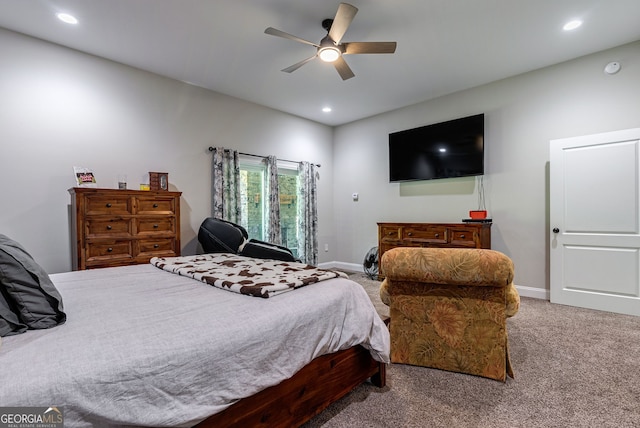 bedroom featuring ceiling fan and carpet flooring