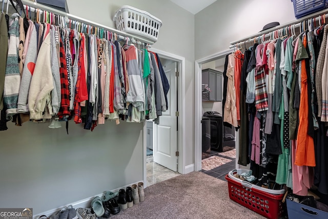 spacious closet featuring carpet floors