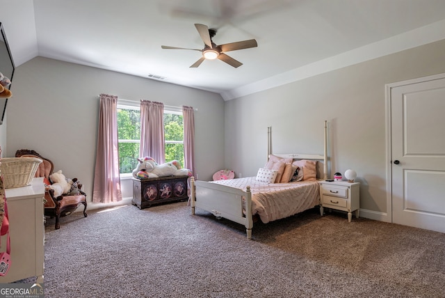 carpeted bedroom with ceiling fan and lofted ceiling