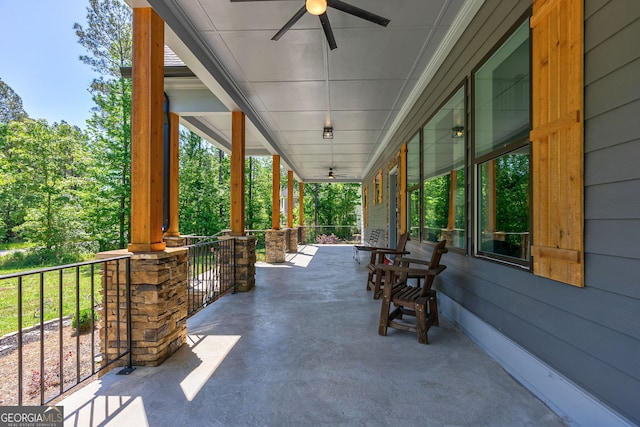 view of patio / terrace with ceiling fan and a porch