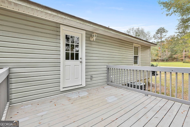 deck featuring a lawn