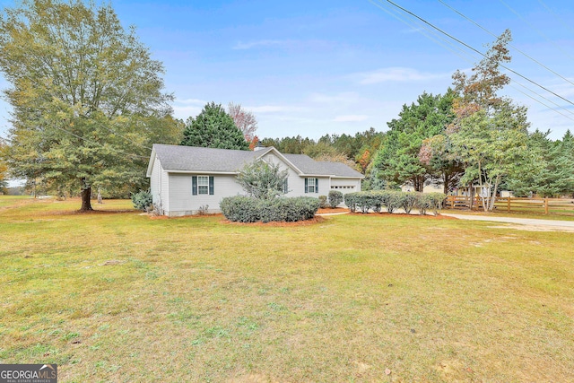 view of front of home with a front yard