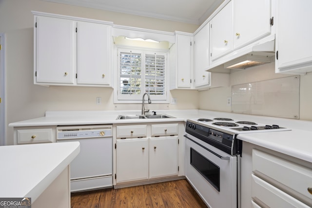 kitchen with white cabinets, dark hardwood / wood-style flooring, premium range hood, sink, and white appliances