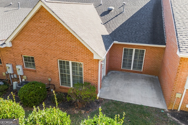 view of home's exterior featuring a patio area