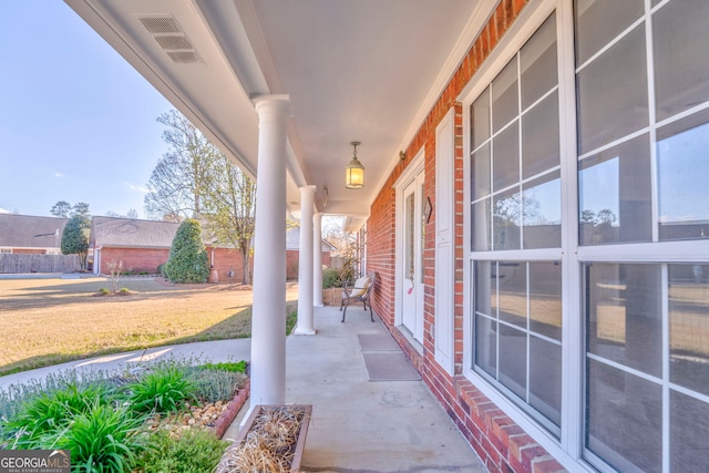 view of patio with a porch and visible vents