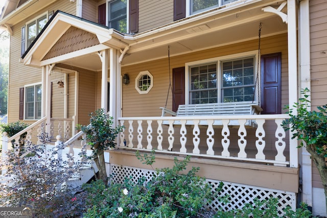 entrance to property with a porch