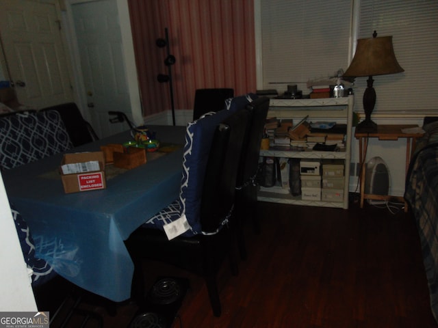 dining area with wood-type flooring