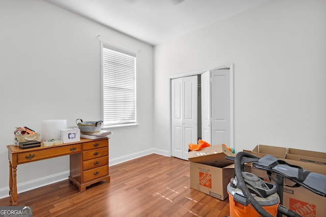 office space with hardwood / wood-style flooring