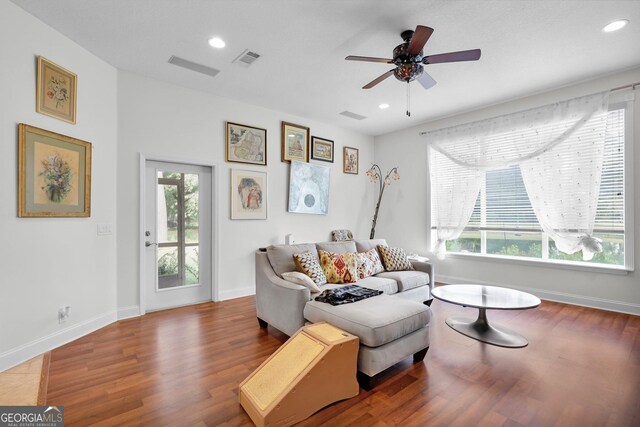 miscellaneous room with ceiling fan, hardwood / wood-style flooring, and plenty of natural light