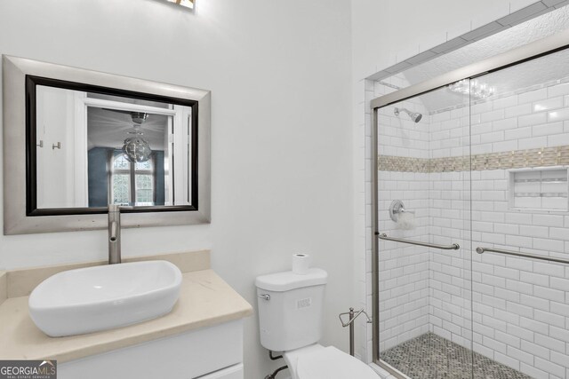 spare room with vaulted ceiling with skylight and hardwood / wood-style floors