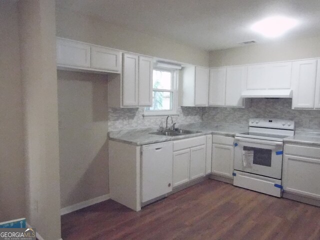 kitchen featuring dark hardwood / wood-style flooring, backsplash, white cabinetry, sink, and white appliances