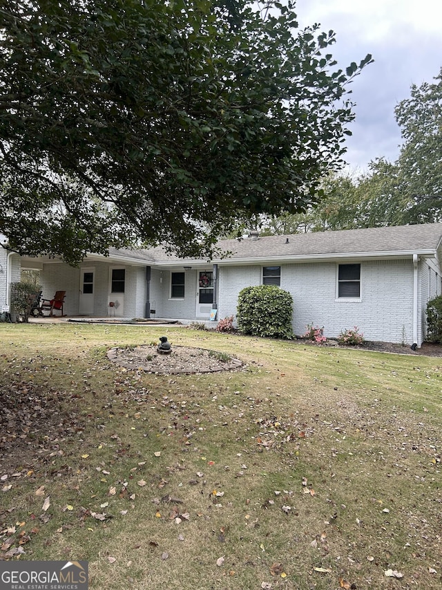 exterior space featuring a yard