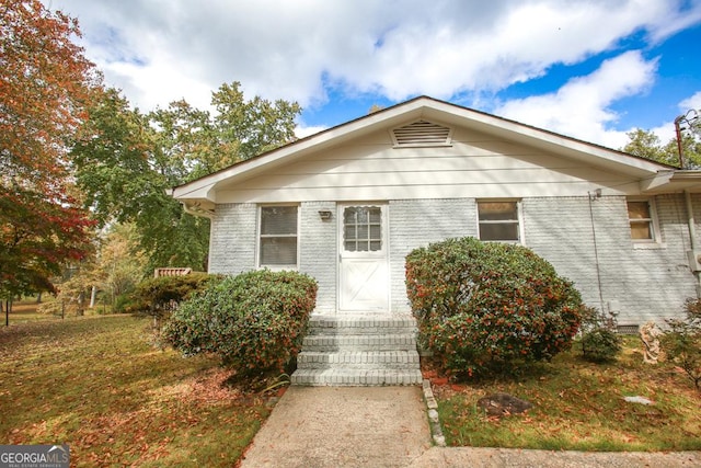 bungalow with crawl space and brick siding