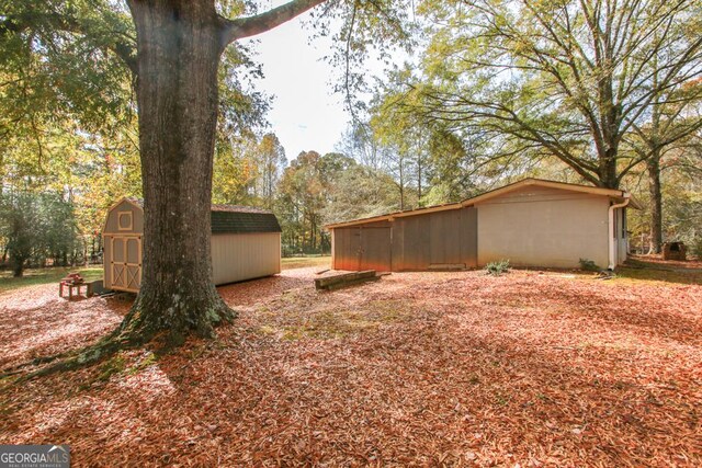 view of parking / parking lot featuring a carport