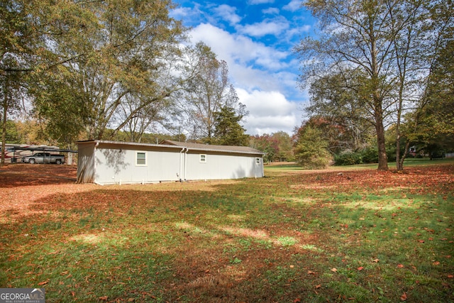 exterior space with a yard