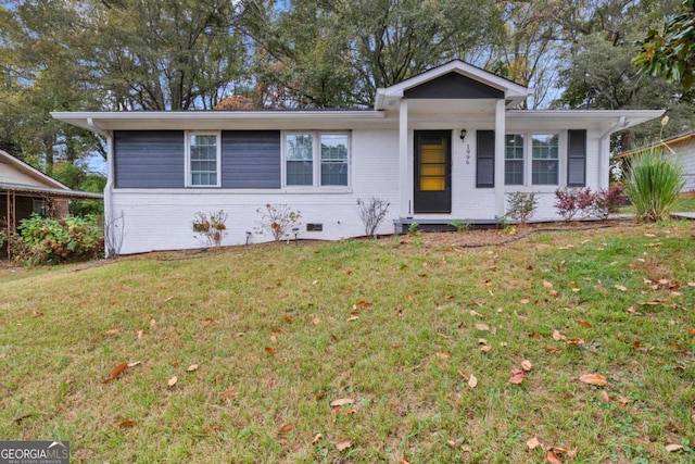 ranch-style home with a front yard